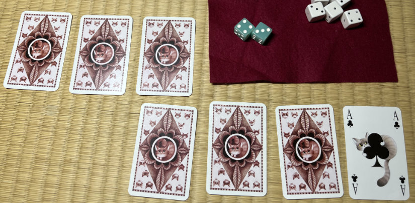 Cards showing the layout of the map. Of the seven cards, only the starting card is revealed.