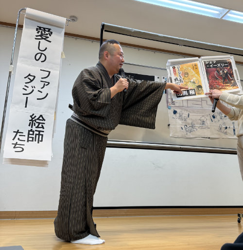 Rakuten explaining the fantasy arts he likes. The left is the Yutaka Izubuchi and the right is Jeff Easley.